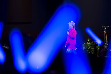 Democratic presidential candidate Hillary Clinton speaks during the 2015 Jefferson-Jackson Dinner with fellow candidates Martin O'Malley and Bernie Sanders in Des Moines, Iowa, October 24, 2015. REUTERS/Scott Morgan