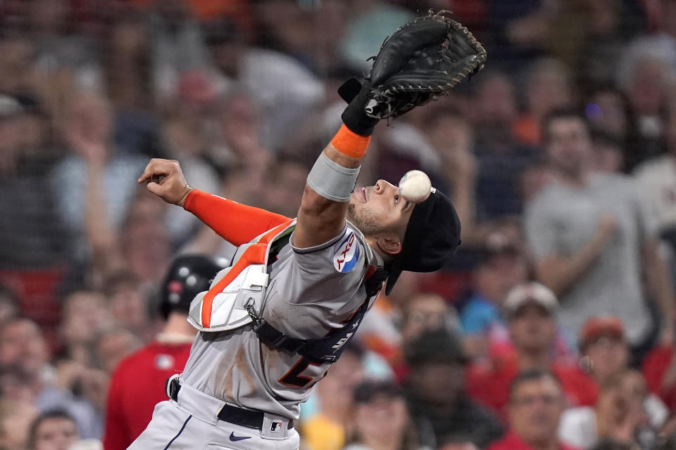 Houston Astros catcher Yainer Diaz drops a foul ball by Boston Red Sox' Justin Turner in the eighth inning of a baseball game, Tuesday, Aug. 29, 2023, in Boston. (AP Photo/Steven Senne)