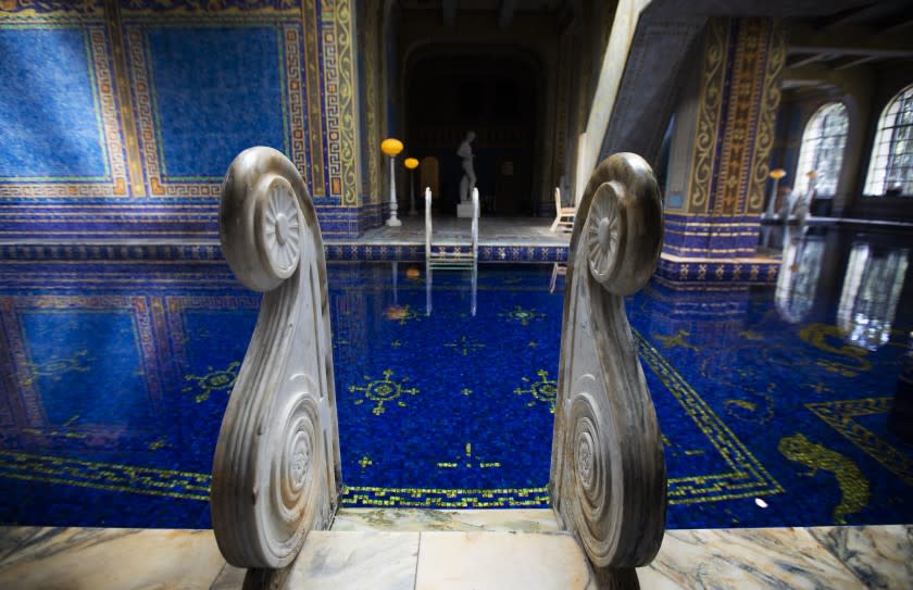 SAN SIMEON, CA - OCTOBER 06: The pool ladders are made of marbel in the Roman Pool at Hearst Castle. It is a tiled indoor pool decorated with eight statues of Roman gods, goddesses and heroes on Tuesday, Oct. 6, 2020 in San Simeon, CA. Hearst Castle, one of California's most popular tourist attractions, has temporarily suspended their tours since mid-March due to the global coronavirus pandemic. (Francine Orr / Los Angeles Times)