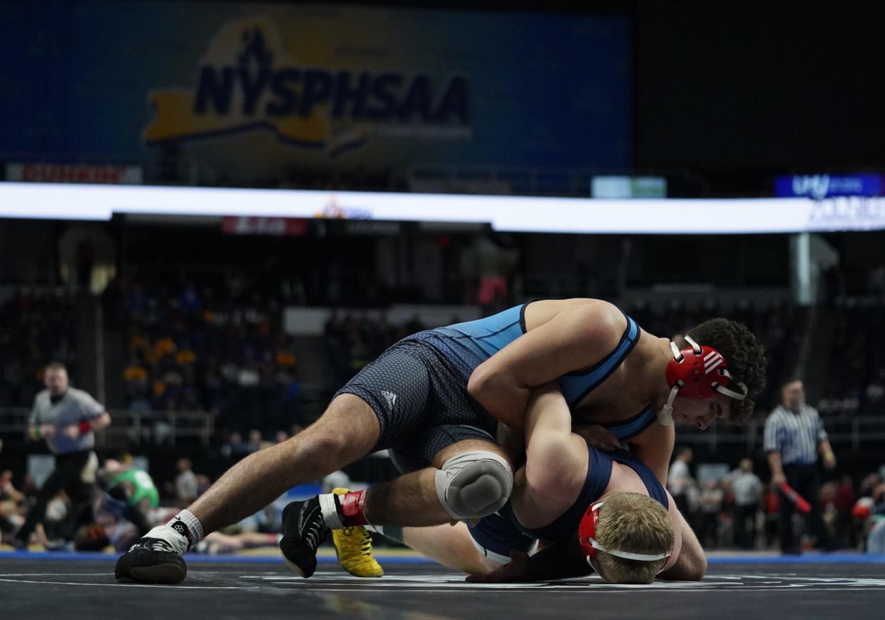 Fox Lane's Alex Berisha wrestles in the second round matches of the NYSPHSAA Wrestling Championships at MVP Arena in Albany, on Friday, February 24, 2023.