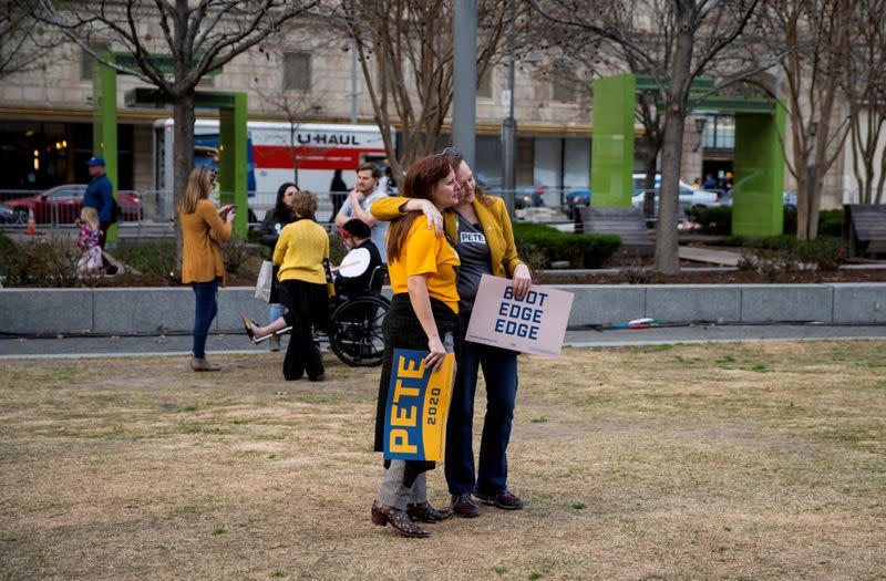 Supporters react to reports of Democratic 2020 U.S. presidential candidate former South Bend, Indiana Mayor Pete Buttigieg suspending his candidacy as they gather before a rally in Dallas