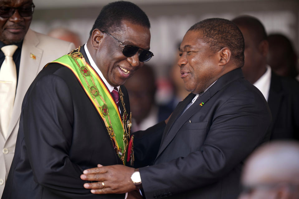 Zimbabwe President Emmerson Mnangagwa, left, greets Mozambique President Filipe Nyusi during his inauguration ceremony at the National Sports Stadium in the capital Harare, Monday, Sept. 4, 2023. Mnangagwa Monday hailed recent elections as a sign of the country’s “mature democracy” and a victory over Western adversaries, as he took an oath of office following polls whose credibility was questioned by multiple observer missions, including those from Africa. (AP Photo /Tsvangirayi Mukwazhi)