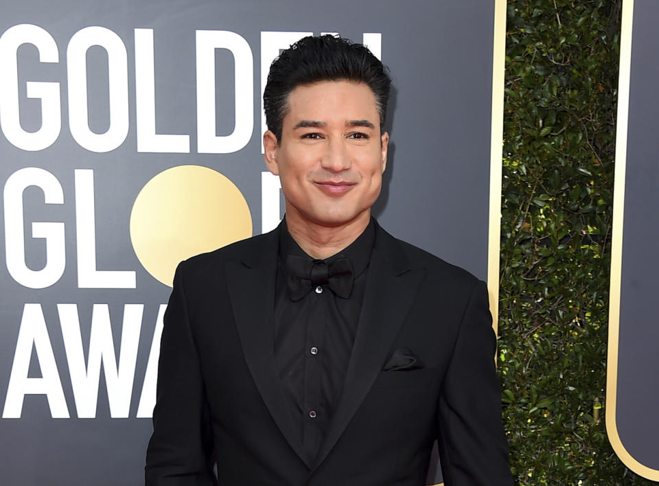 FILE - This Jan. 6, 2019 file photo shows Mario Lopez at the 76th annual Golden Globe Awards in Beverly Hills, Calif. Lopez, the host of “Access Hollywood,” apologized Wednesday, July 31, for telling conservative commentator Candace Owens that it’s “dangerous” and “alarming” for parents to honor the wishes of young children who identify with a gender other than the one assigned at birth. He said in a statement released by his publicist that his remarks were “ignorant and insensitive.” (Photo by Jordan Strauss/Invision/AP, File)