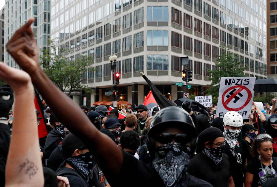 <p>Antifascists, opponents of a white nationalist-led rally marking the one-year anniversary of the 2017 Charlottesville “Unite the Right” protests, gather in downtown Washington, U.S., August 12, 2018. (Photo: Leah Millis/Reuters) </p>