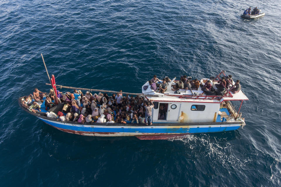 A boat carries ethnic-Rohingya off North Aceh, Indonesia, on Wednesday, June 24, 2020. Indonesian fishermen discovered dozens of hungry, weak Rohingya Muslims on the wooden boat adrift off the country's northernmost province, an official said. (AP Photo/Zik Maulana)