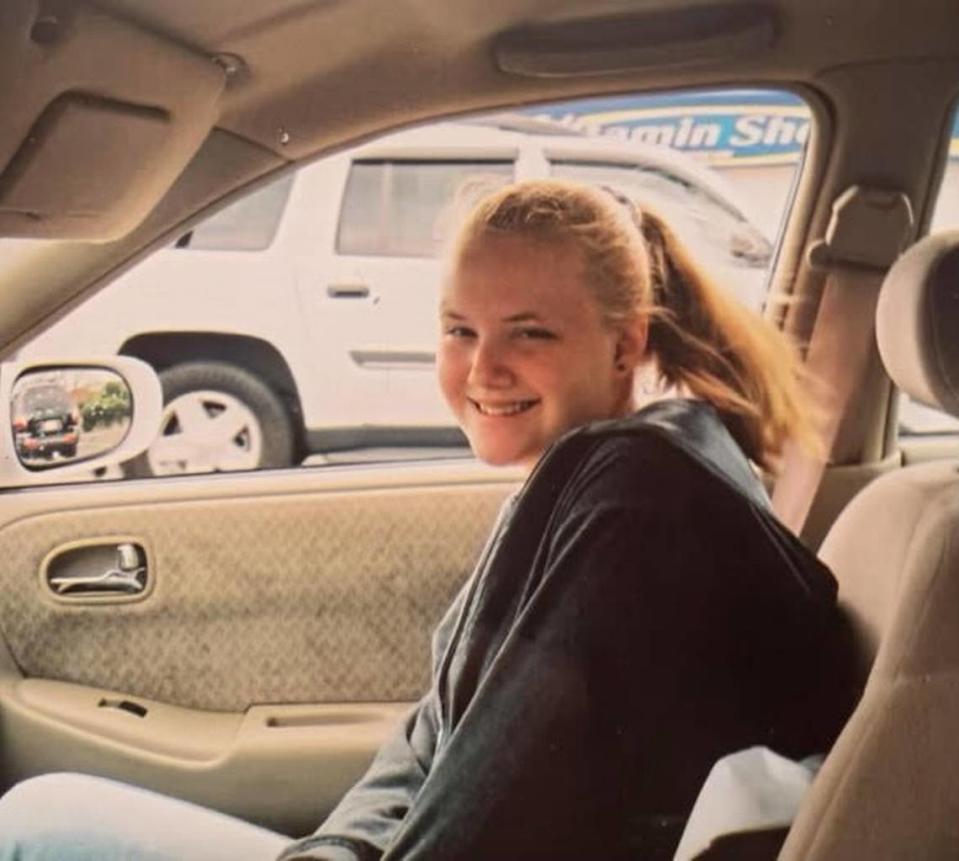 Tara Rosado sits in a car in this undated photo provided by her family.