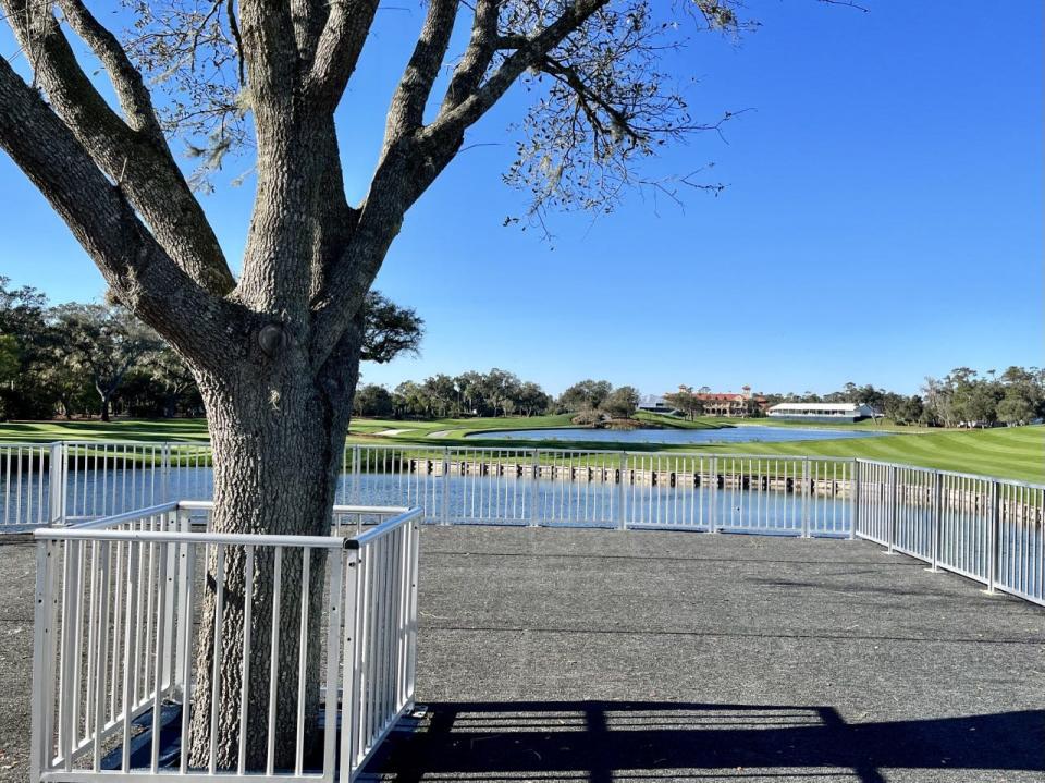 A fan hospitality area has been built to the right of the new ninth tee at the Players Stadium Course at TPC Sawgrass. The deck of the structure was built to preserve an oak tree.