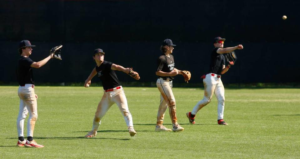 Baseball players at Central High School in Phenix City warm up their throwing arms during practice Monday afternoon. 04/15/2024