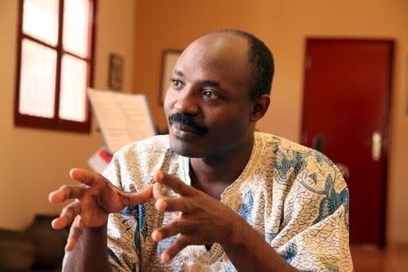 Journalist Rafael Marques de Morais gestures during an interview at his home in Luanda, Angola, in this picture taken May 12, 2015. REUTERS/Herculano Coroado