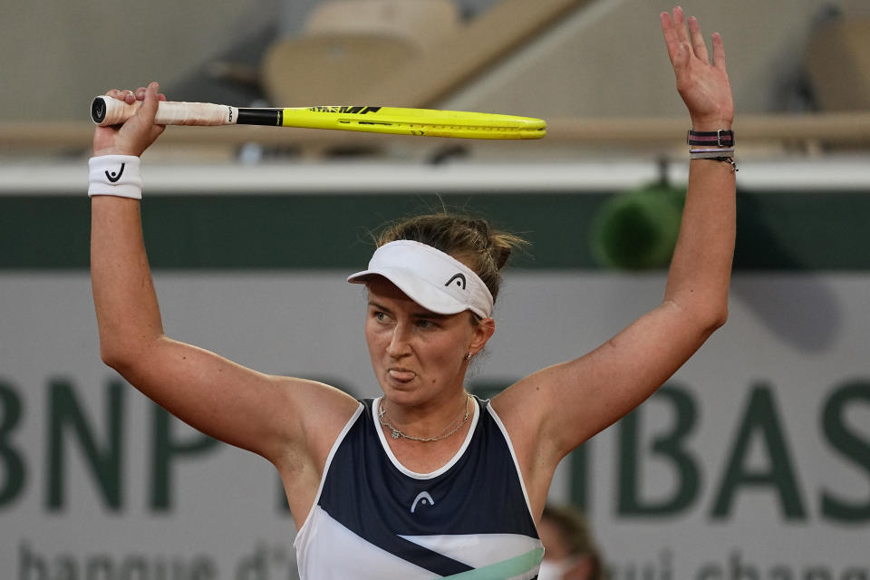 Czech Republic's Barbora Krejcikova apologises after winning point as she plays Maria Sakkari of Greece during their semifinal match of the French Open tennis tournament at the Roland Garros stadium Thursday, June 10, 2021 in Paris. (AP Photo/Michel Euler)