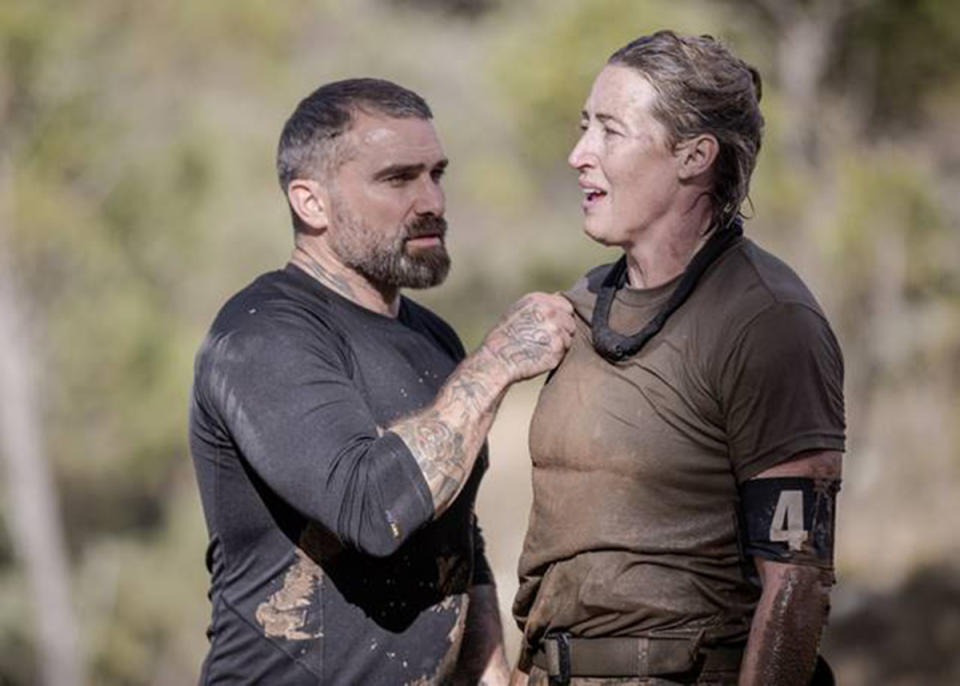 SAS Australia star Jana Pittman collapses and is assisted by instructor Ant Middleton. Photo: Channel 7.