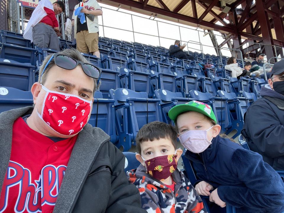 Daniel Horowitz, 42, takes his children, Adam, 4, and Emily, 8, to Citizens Bank Park in Philadelphia on April 4. Horowitz is concerned unvaccinated adults could endanger his son and daughter.