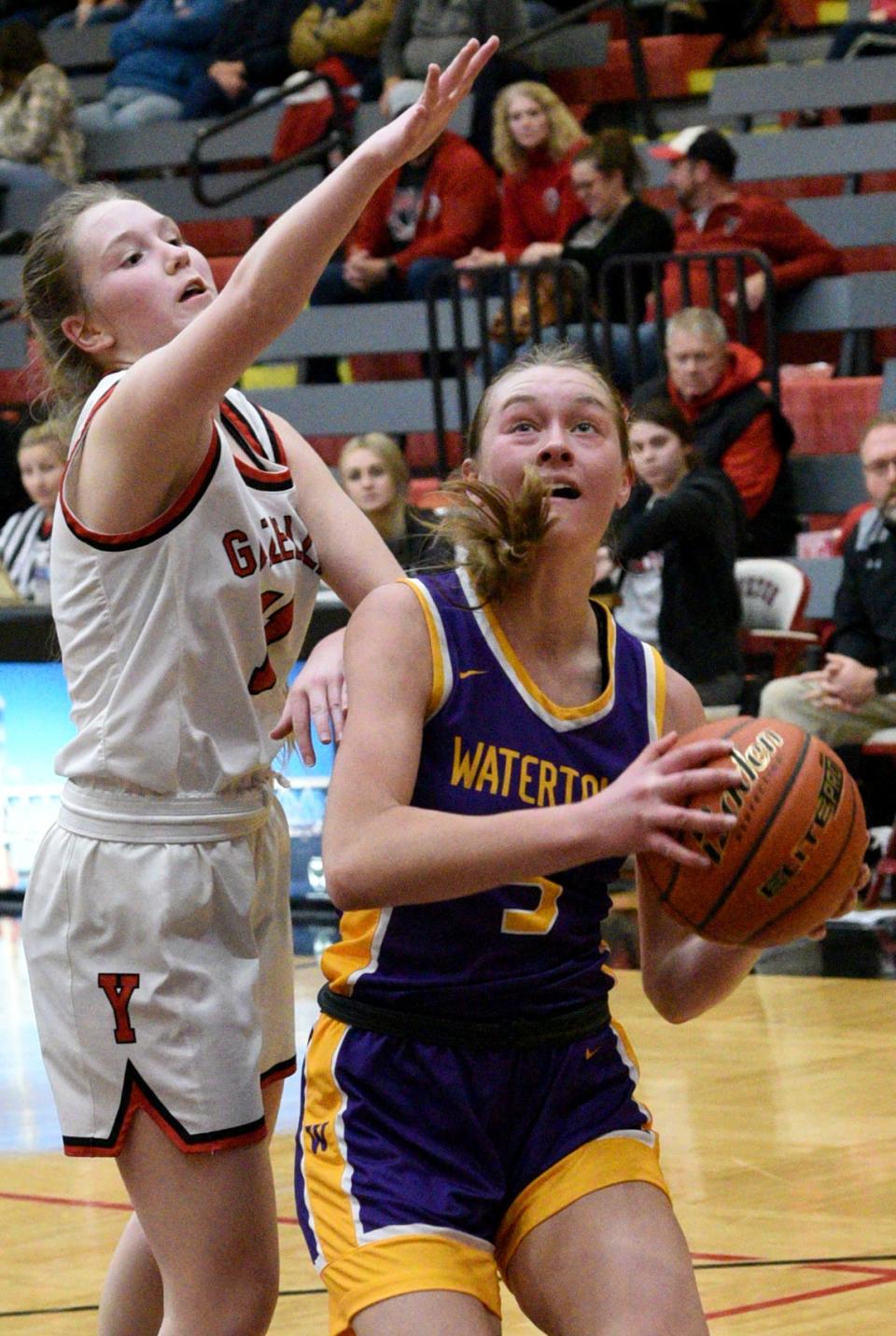 Watertown's Emery Thury goes up for a layup against Yankton's Bailey LaCroix during their Eastern South Dakota Conference girls basketball game on Thursday, Jan. 12, 2023 at the Yankton High School Gym.