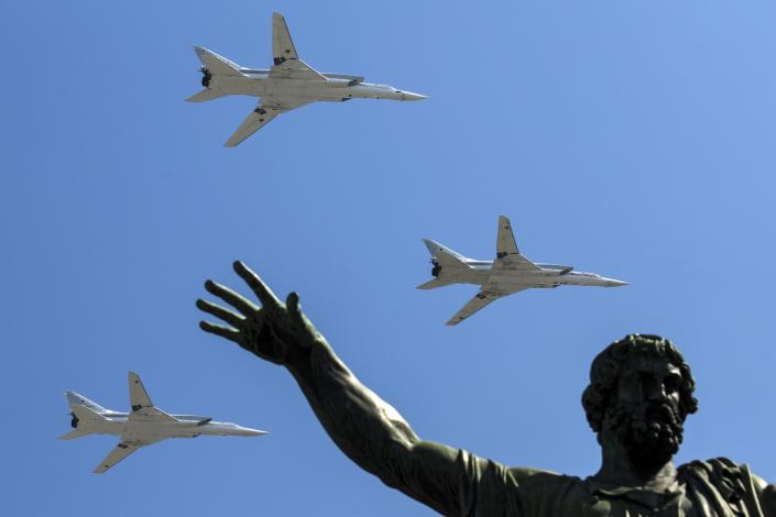 FILE - Russian Tu-22M-3 long-range bombers fly during the Victory Day military parade marking 71 years after the victory in WWII in Red Square in Moscow, Russia, Monday, May 9, 2016. The latest Russian missile barrage against Ukraine’s civilian infrastructure on Thursday, March 9, 2023 has marked one of the largest such attacks in months. Russia has used the Tu-22M to launch Kh-22 cruise missiles at targets in Ukraine. (AP Photo, File)