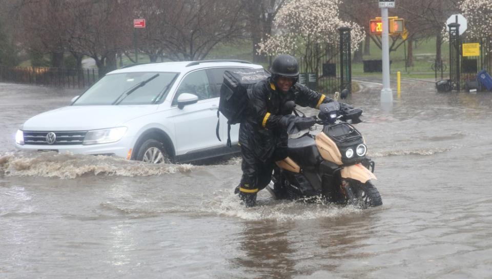 New York City experienced a rainfall record during Saturday’s storm as droves of commuters were flooded on the roads and airlines experienced delays, and cancellations. TOMAS E. GASTON