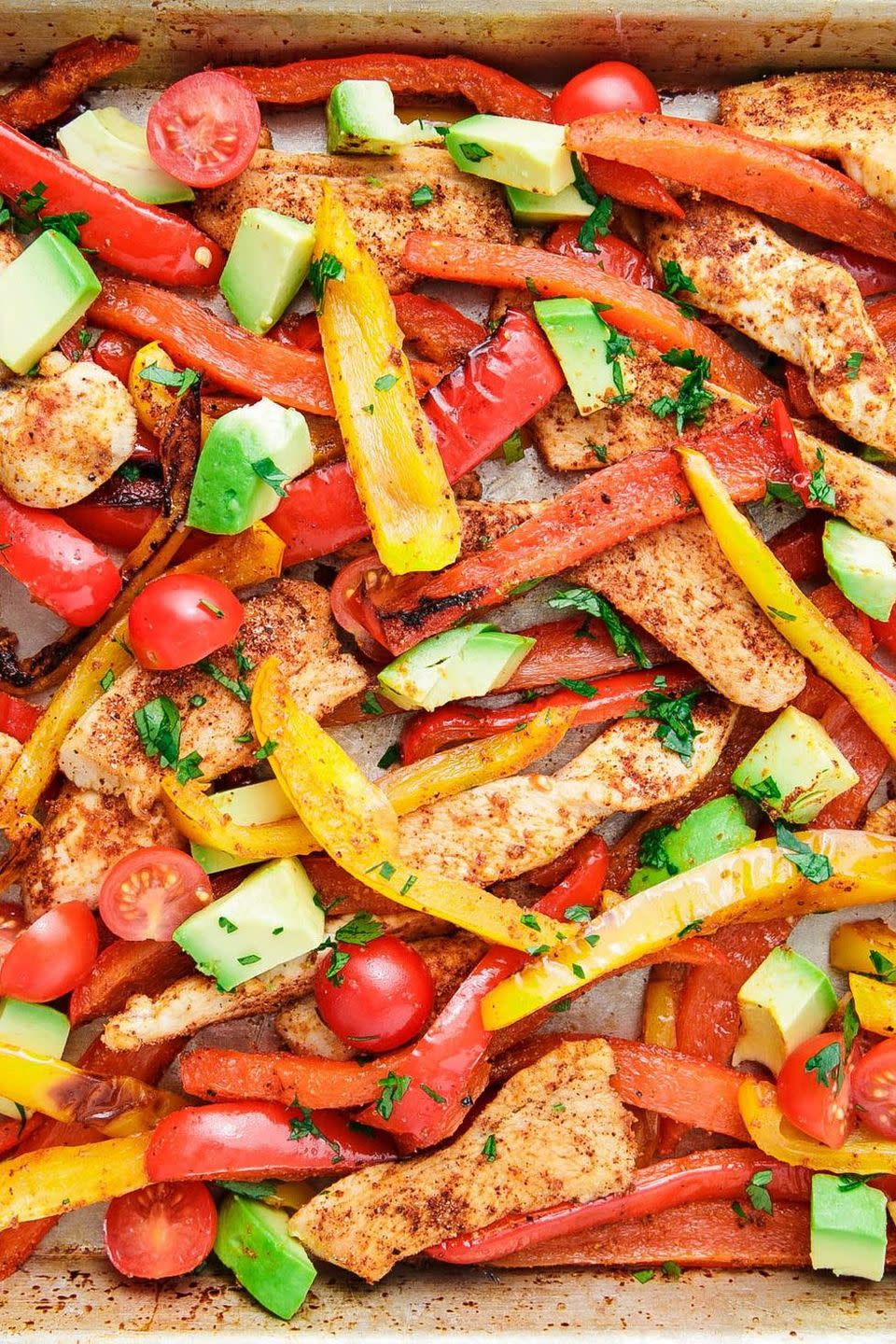 <p>Making a whole recipe on a single baking tray is perfect for meal prepping. For these fajitas you simply toss all of the ingredients—chicken and vegetables—in an easy marinade of avocado oil and taco spices like cumin and chilli powder and then bake it all together on a baking tray.</p><p>Get the <a href="https://www.delish.com/uk/cooking/recipes/a35332716/sheet-pan-chicken-fajitas-recipe/" rel="nofollow noopener" target="_blank" data-ylk="slk:One-Tray Fajitas" class="link ">One-Tray Fajitas</a> recipe.</p>