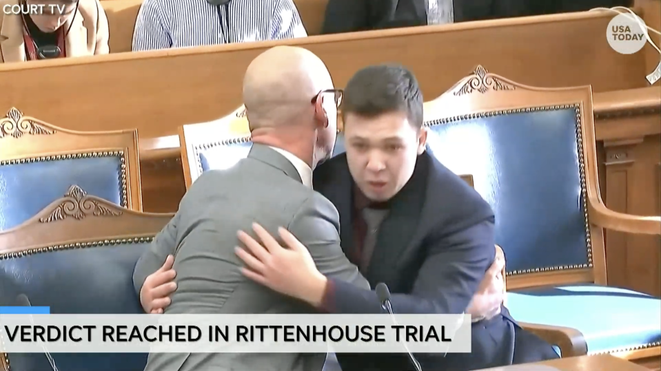 Defense attorney Corey Chirafisi hugs Kyle Rittenhouse after a verdict of not guilty is read in the trial of Kyle Rittenhouse in Kenosha, Wisc. on Nov. 19, 2021. Rittenhouse faced charges of first-degree intentional homicide, first-degree reckless homicide and attempted first-degree intentional homicide stemming from shootings during a violent night of protest over police brutality and racial justice in Kenosha, Wisconsin, in 2020.