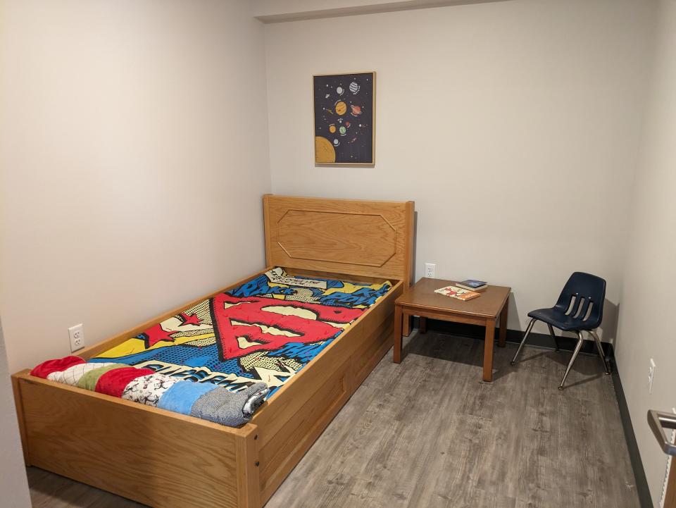 Model of a single child's room at the Bishop Dudley Center for Families.