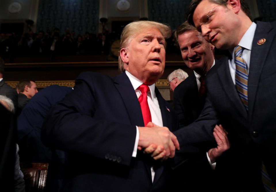 PHOTO: In this Feb. 4, 2020, file photo, President Donald Trump is greeted by Rep. Mike Johnson before the State of the Union address in the House chamber in Washington, D.C.  (Pool/Getty Images, FILE)