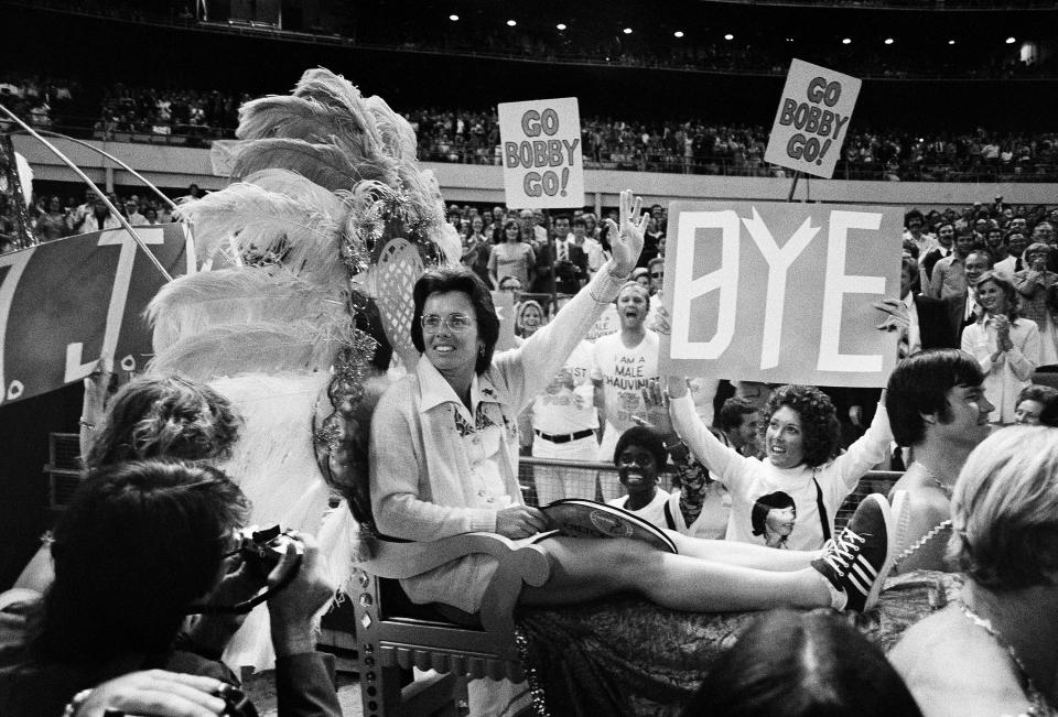 Billie Jean King waves to crowds at the Astrodome in Houston, Texas, on Sept. 20, 1973, before her match against Bobby Riggs.