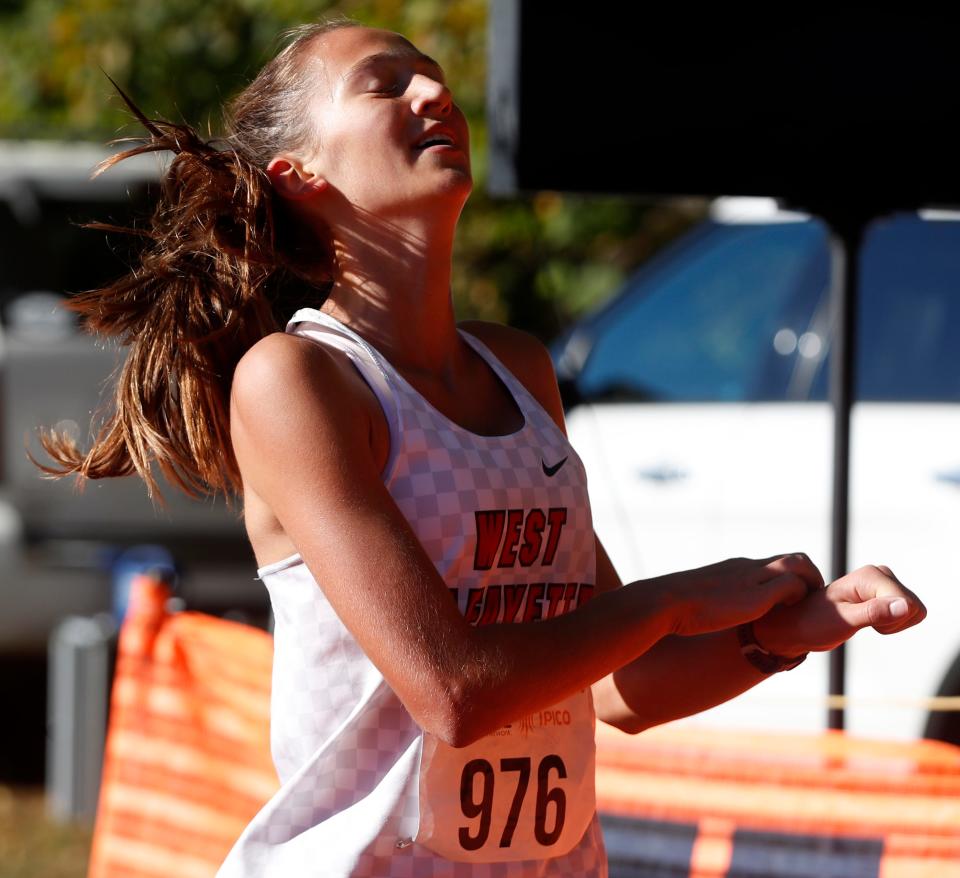 West Lafayette’s Henriett Schminke crosses the finish line during the IHSAA cross country sectional, Saturday, Oct. 8, 2022, at Tippecanoe Ampitheater in Lafayette, Ind. 