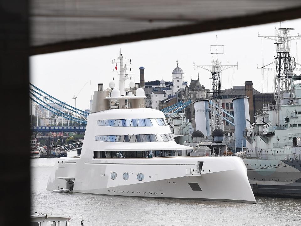 The Philippe Starck-designed boat is seen moored next to HMS Belfast on the River Thames on September 7, 2016 in London