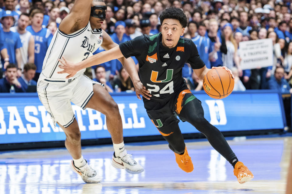 Duke guard Jaylen Blakes (2) guards Miami guard Nijel Pack (24) in the first half of an NCAA college basketball game on Saturday, Jan. 21, 2023, in Durham, N.C. (AP Photo/Jacob Kupferman)