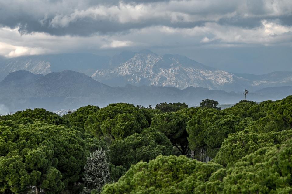 The Taurus Mountains in south Turkey, where the Morca cave is located is seen in the background.