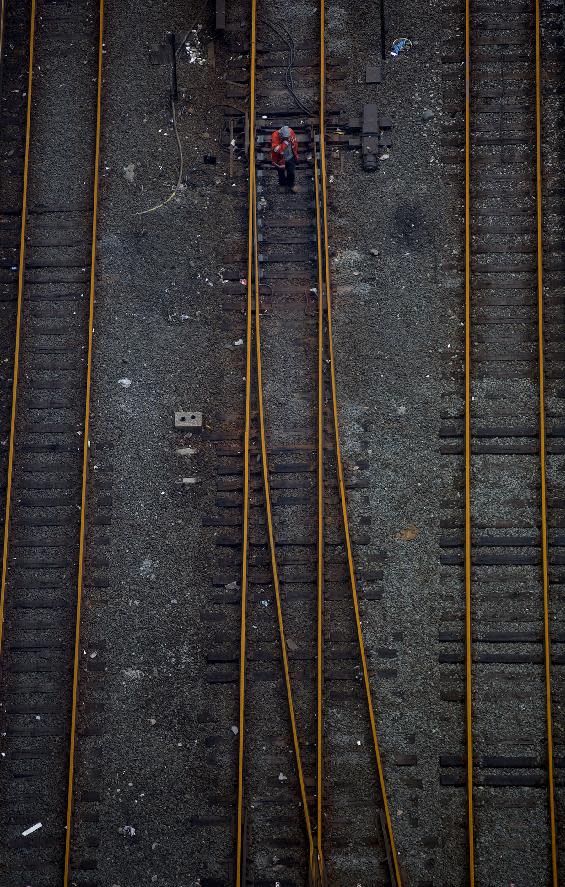 Railroad tracks West of Penn Station bear a brown color Wednesday, Oct. 31, 2012, in New York. Travel in the Northeast creaked back into motion on Wednesday, a grinding, patchy recovery that made it clear that stranded travelers will struggle to get around for days to come. (AP Photo/Craig Ruttle)