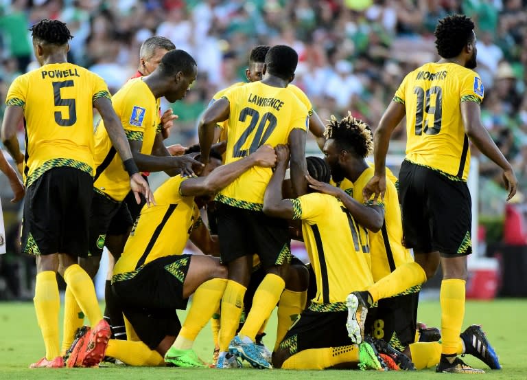 Jamaica's players celebrate after scoring a goal against Mexico during their 2017 CONCACAF semi-final match, at Rose Bowl in Pasadena, California, on July 23