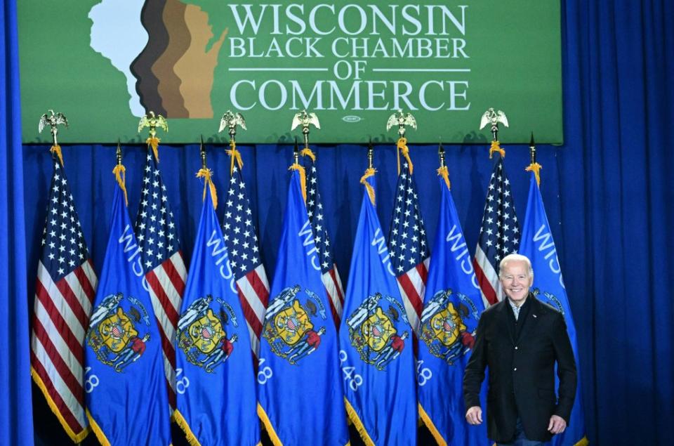President Joe Biden takes the stage Wednesday to speak on his economic policies at the Wisconsin Black Chamber of Commerce in Milwaukee. (Photo by Mandel Ngan/AFP via Getty Images)