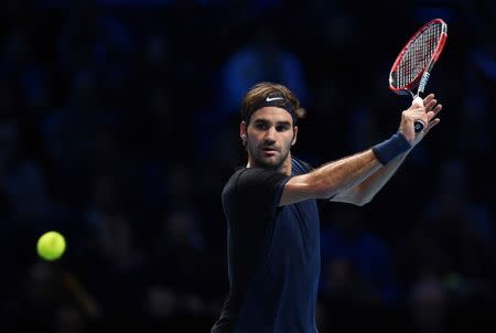 Tennis - Barclays ATP World Tour Finals - O2 Arena, London - 21/11/15 Men's Singles - Switzerland's Roger Federer in action during his semi final match with Switzerland's Stanislas Wawrinka Action Images via Reuters / Tony O'Brien Livepic