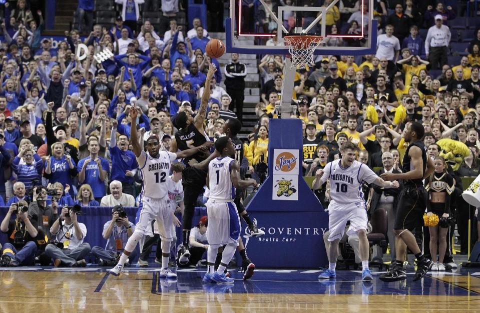 Creighton's Jahenns Manigat (12), Austin Chatman (1) and Grant Gibbs (10) start to celebrate as a last-second shot from Wichita State bounces away from the rim in the second half of an NCAA college basketball game in the championship of the Missouri Valley Conference tournament on Sunday, March 10, 2013, in St. Louis. Creighton defeated Wichita State 68-65. (AP Photo/Tom Gannam)