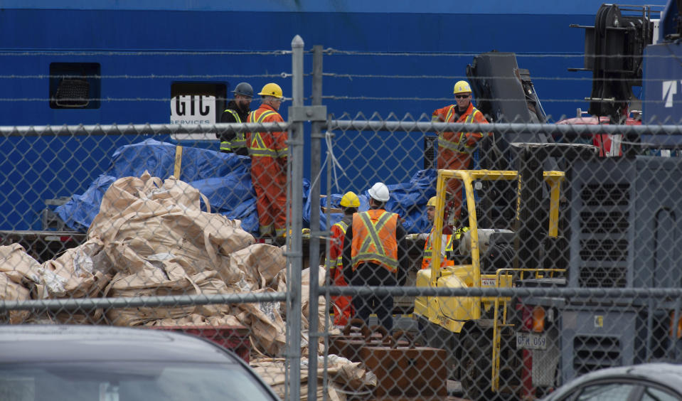 Debris from the Titan submersible, recovered from the ocean floor near the wreck of the Titanic, is unloaded from the ship Horizon Arctic at the Canadian Coast Guard pier in St. John's, Newfoundland on Wednesday, June 28, 2023. (Paul Daly/The Canadian Press via AP)