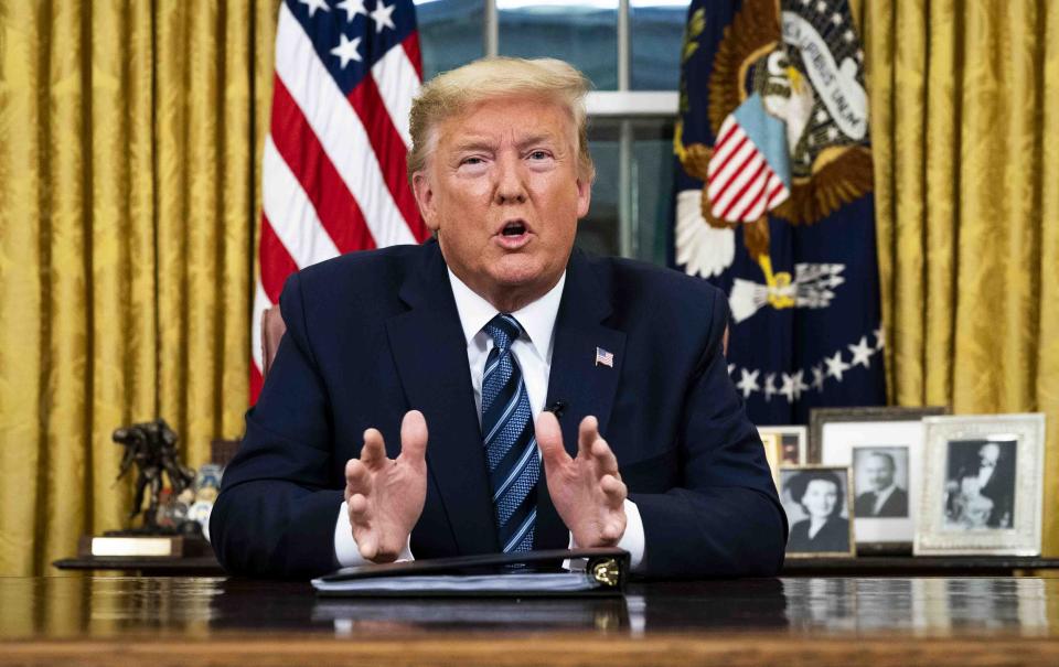 President Donald Trump speaks in an address to the nation from the Oval Office at the White House about the coronavirus Wednesday, March, 11, 2020, in Washington. (Doug Mills/The New York Times via AP, Pool)