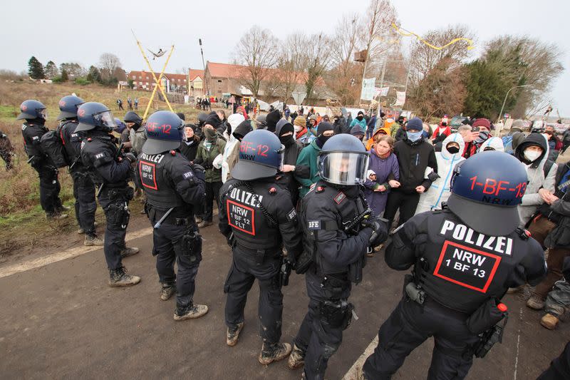 Demonstrators protest ahead of the evacuation of the Luetzerath village