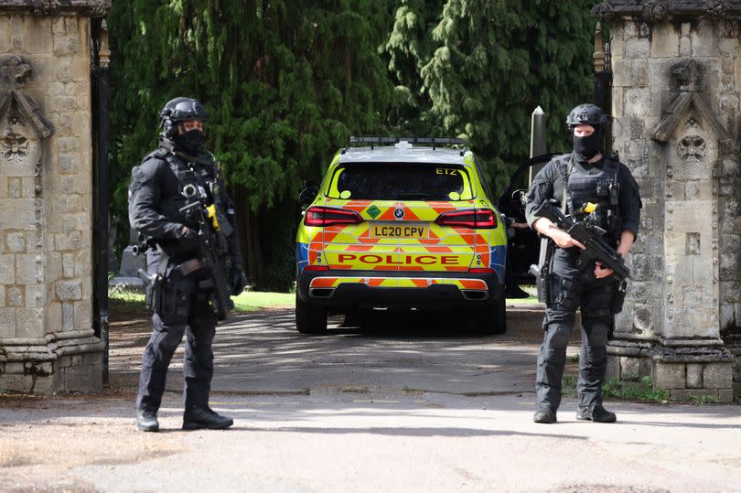 Scene at Lavender Hill Cemetery where armed police were pictured in search for Kyle Clifford