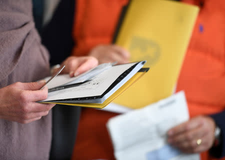 People cast their votes at a polling station in German city-state of Bremen parliamentary elections in Bremen, Germany May 26, 2019. REUTERS/Fabian Bimmer