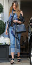 <p>Vergara coordinated in shades of black and blue on an L.A. outing, hitting the town in a shoulder-baring top, cuffed jeans, black platform sandals, a patterned scarf, and a small navy Fendi handbag (shop it in black <a rel="nofollow noopener" href="http://www.neimanmarcus.com/Fendi-2Jours-Petite-Satchel-Bag-Black/prod163390076/p.prod" target="_blank" data-ylk="slk:here;elm:context_link;itc:0;sec:content-canvas" class="link ">here</a>). </p>