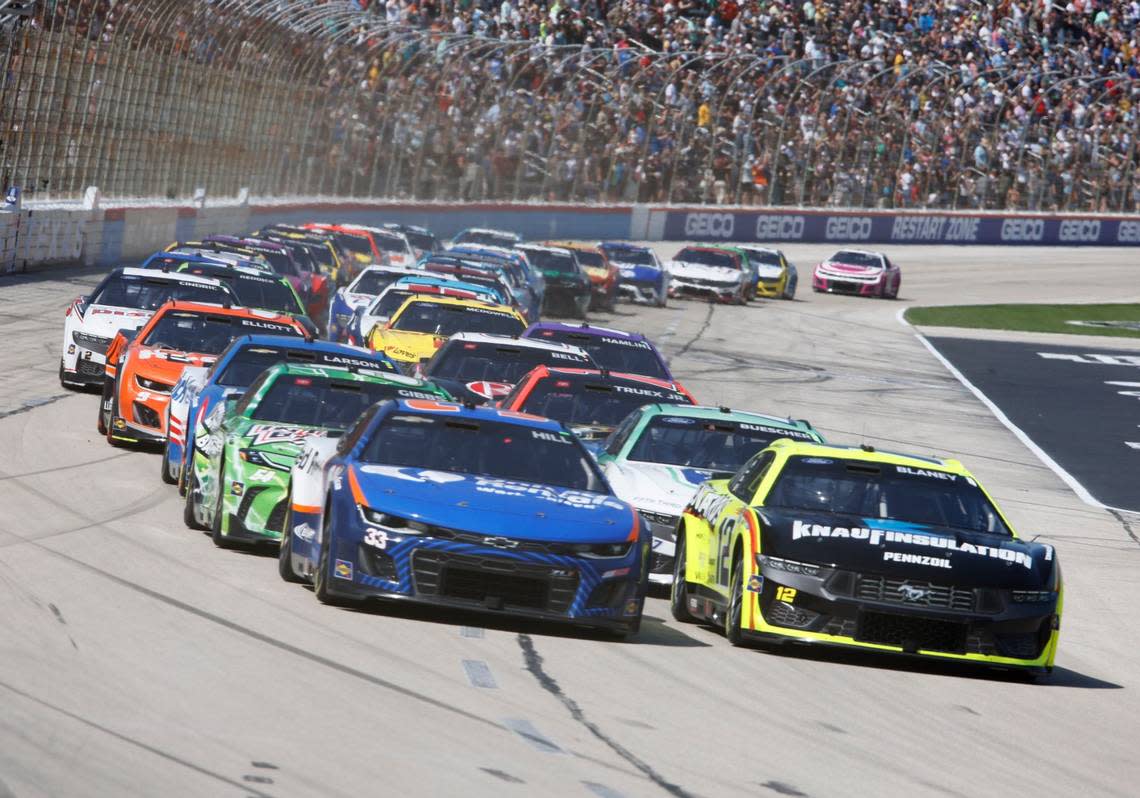 Austin Hill (33) and Ryan Blaney (12) lead the pack past the green flag at the start of Stage 2 of the Auto Trader Echo Park 400 at Texas Motor Speedway in Fort Worth, Texas, April 14, 2024. Kyle Larson won stage 1. (Special to the Star-Telegram/Bob Booth) Bob Booth/(Special to the Star-Telegram)