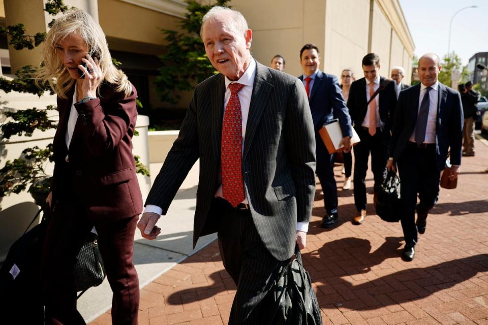 Members of the legal team for Fox News leave a Delaware courthouse on 18 April after a settlement with Dominion Voting Systems was announced. (Getty Images)