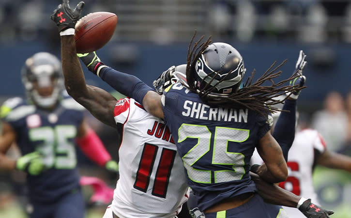 Oct 16, 2016; Seattle, WA, USA; Seattle Seahawks cornerback Richard Sherman (25) defends a pass intended for Atlanta Falcons wide receiver Julio Jones (11) during the fourth quarter at CenturyLink Field. Seattle defeated Atlanta, 26-24.