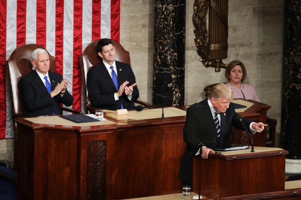 WASHINGTON, DC - FEBRUARY 28:  U.S. President Donald Trump addresses a joint session of the U.S. Congress as Vice President Mike Pence (L) and House Speaker Rep. Paul Ryan (R) (R-WI) look on on February 28, 2017 in the House chamber of  the U.S. Capitol in Washington, DC. Trump's first address to Congress focused on national security, tax and regulatory reform, the economy, and healthcare.  (Photo by Chip Somodevilla/Getty Images)