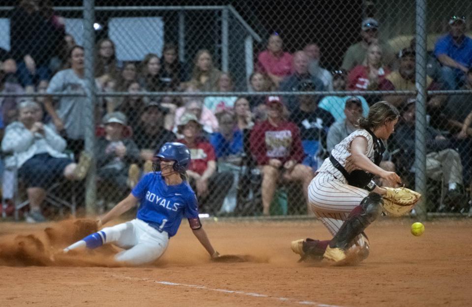 Brett Watson (1) scores to take a 7-6 Royals lead in the top of the 7th inning during the Jay vs Northview District 1-1A championship softball game at Central High School in Milton on Thursday, May 2, 2024.