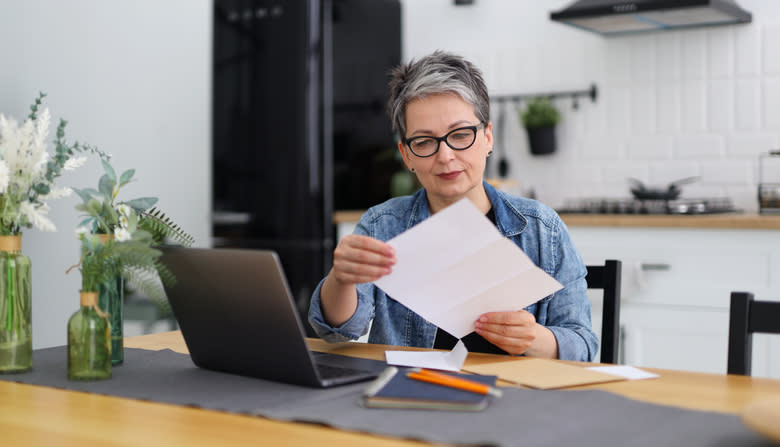 A woman reviews a power of attorney in California. 