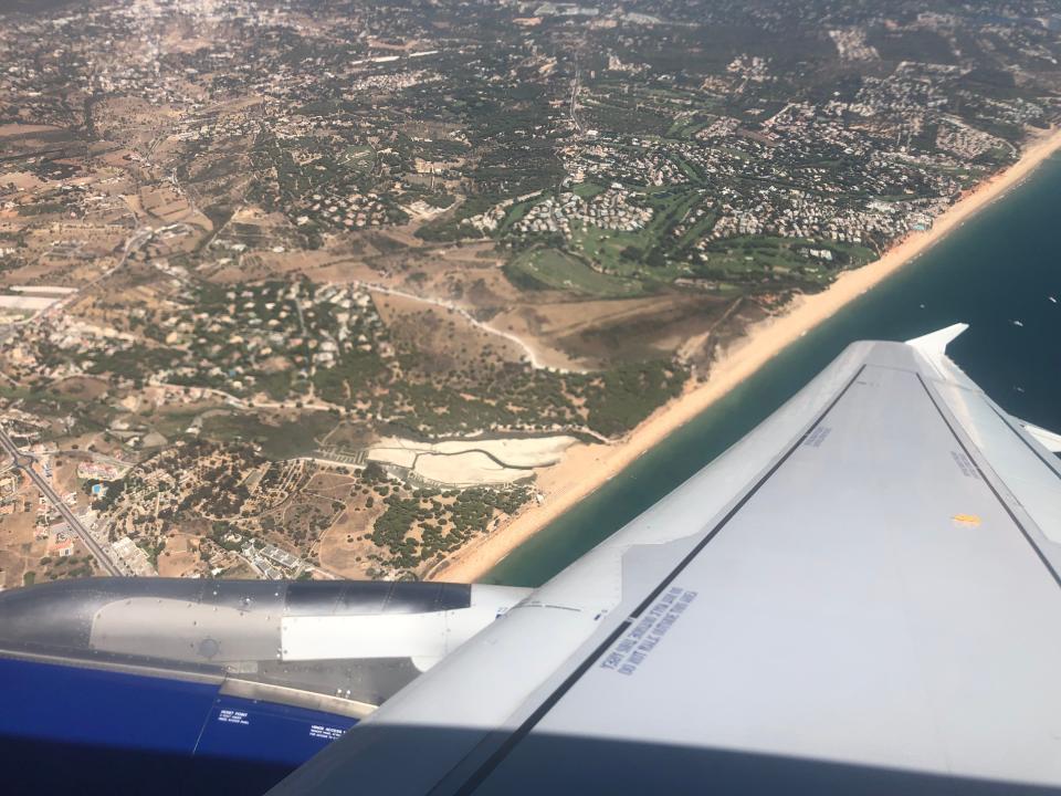 Landing soon: a British Airways Airbus A320 approaching Faro on the south coast of Portugal (Simon Calder)