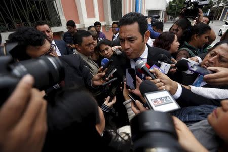 Guatemalan presidential candidate Jimmy Morales of the National Convergence Front, speaks with the media outside the Supreme Electoral Tribunal (TSE) in Guatemala City, October 21, 2015. REUTERS/Jorge Dan Lopez