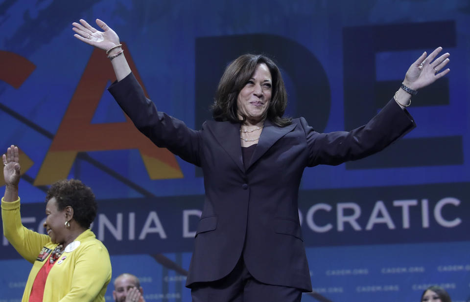 Democratic presidential candidate Sen. Kamala Harris, D-Calif., gestures in front of Congresswoman Barbara Lee before speaking during the 2019 California Democratic Party State Organizing Convention in San Francisco, Saturday, June 1, 2019. (AP Photo/Jeff Chiu)