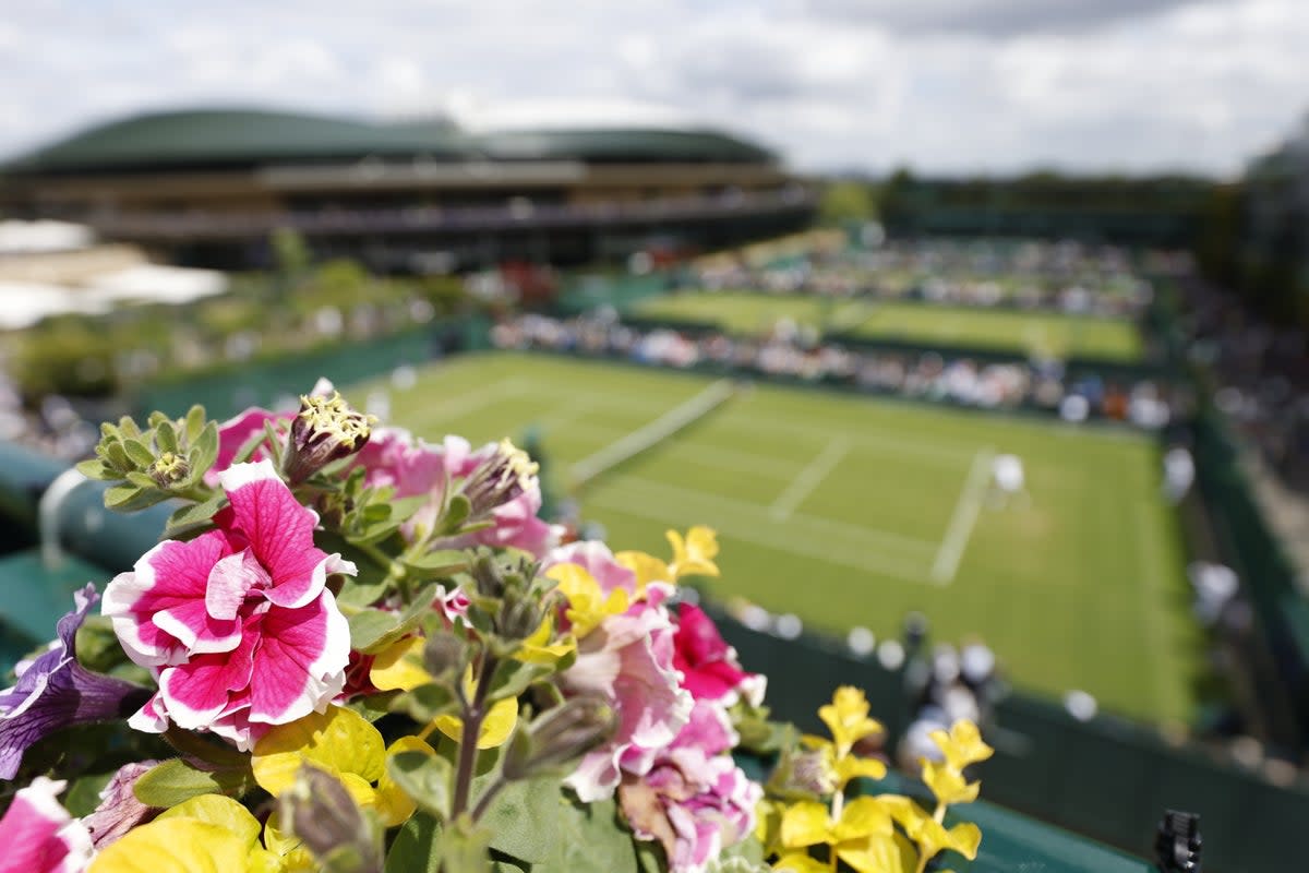 A general view of flowers in front of Court 14 during day two of the 2022 Wimbledon Championships at the All England Lawn Tennis and Croquet Club, Wimbledon. Picture date: Tuesday June 28, 2022. (PA Wire)