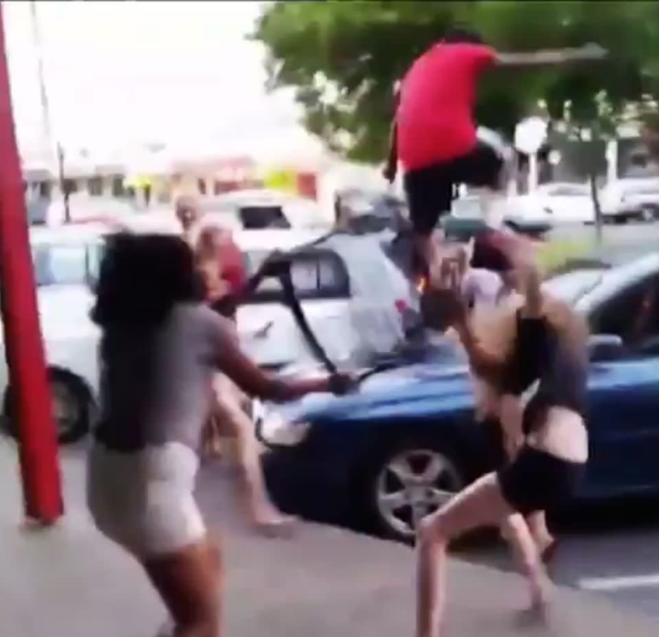 One of the sisters was assaulted with a chair as a man stomped on their car. Photo: 7 News